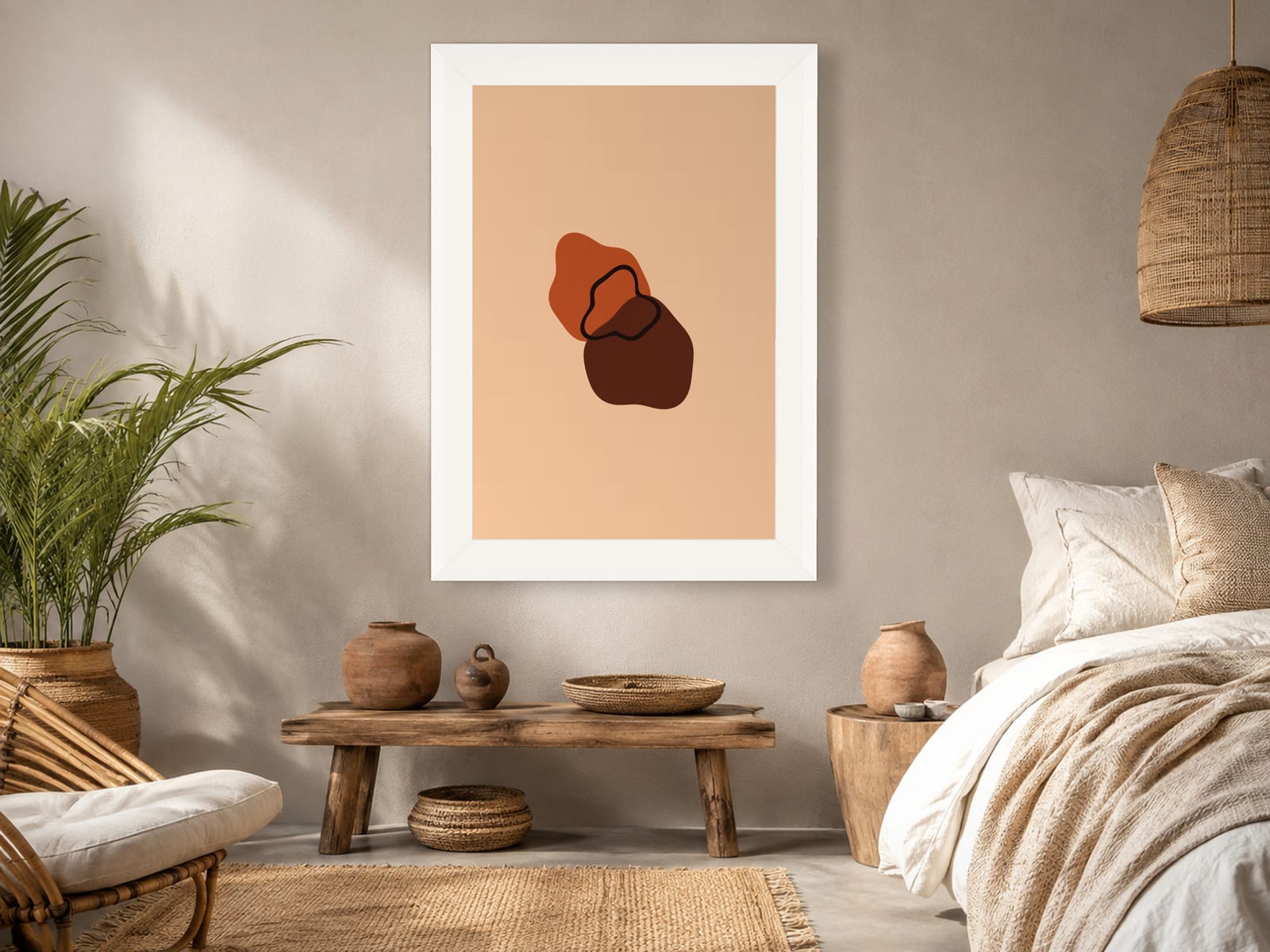 Boho Ochre No. 003, orange and peach boho composed silhouettes wall art print in a white frame, styled in a boho bedroom