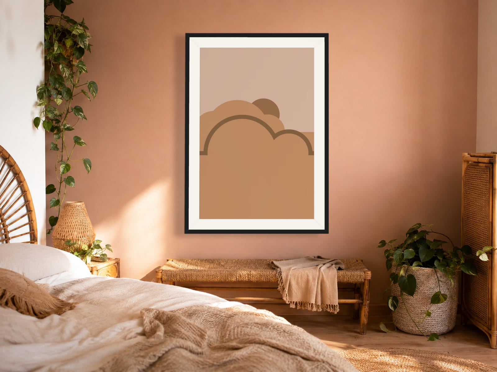 Boho Ochre No. 011, tan and beige boho composed silhouettes wall art print in a thin black frame, on a boho bedroom wall